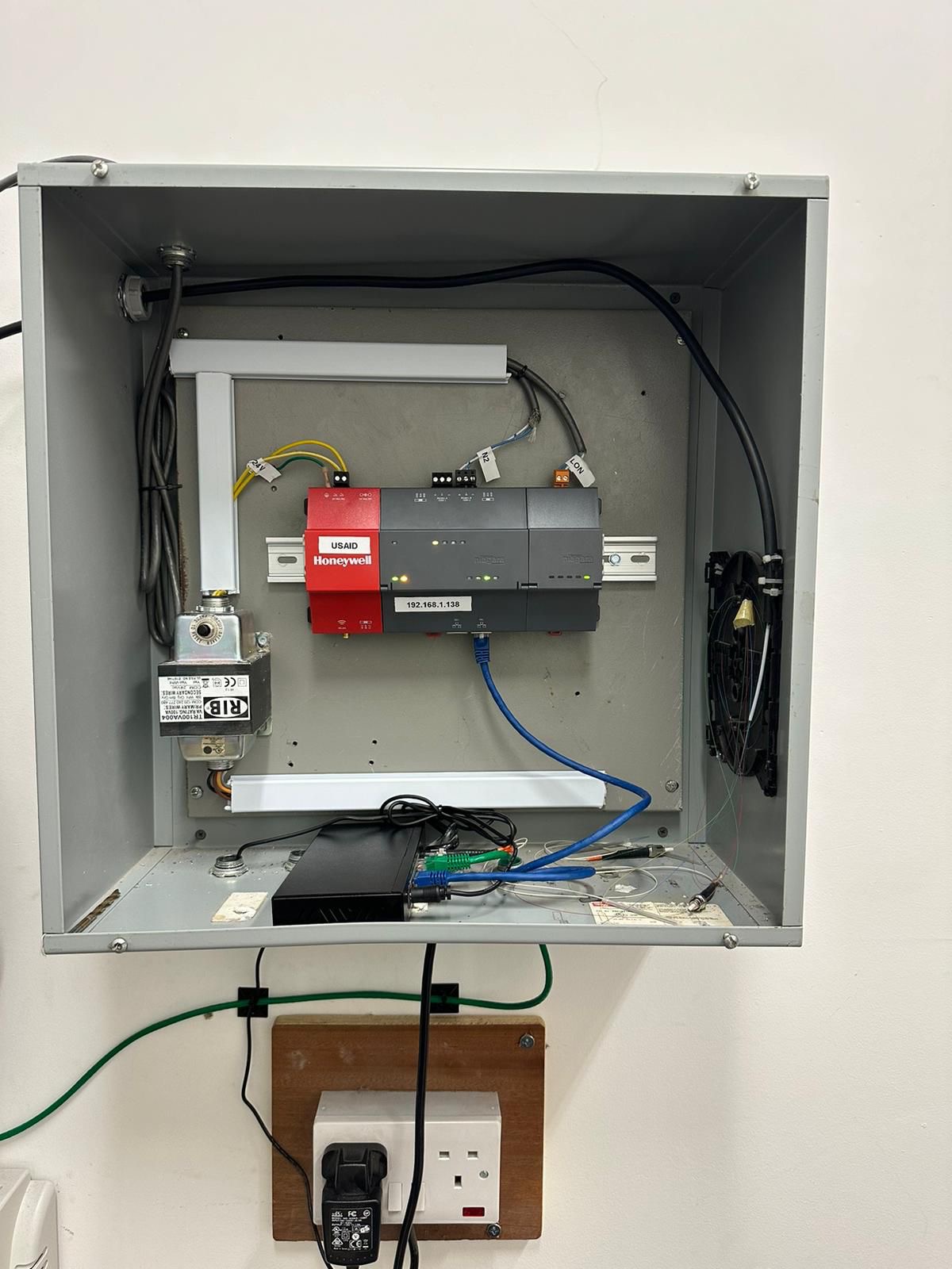 New building automation controller installed in an enclosure during a controls upgrade